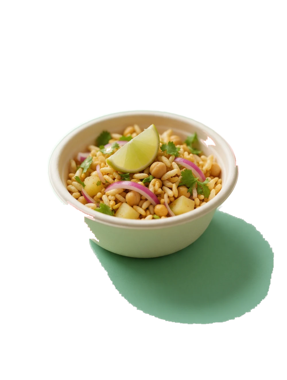 A bowl of chatpate with puffed rice, chickpeas, potato, onion and lime